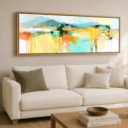 Vibrant Equine Horizon Horse Landscape panoramic canvas wall art displayed above a sofa