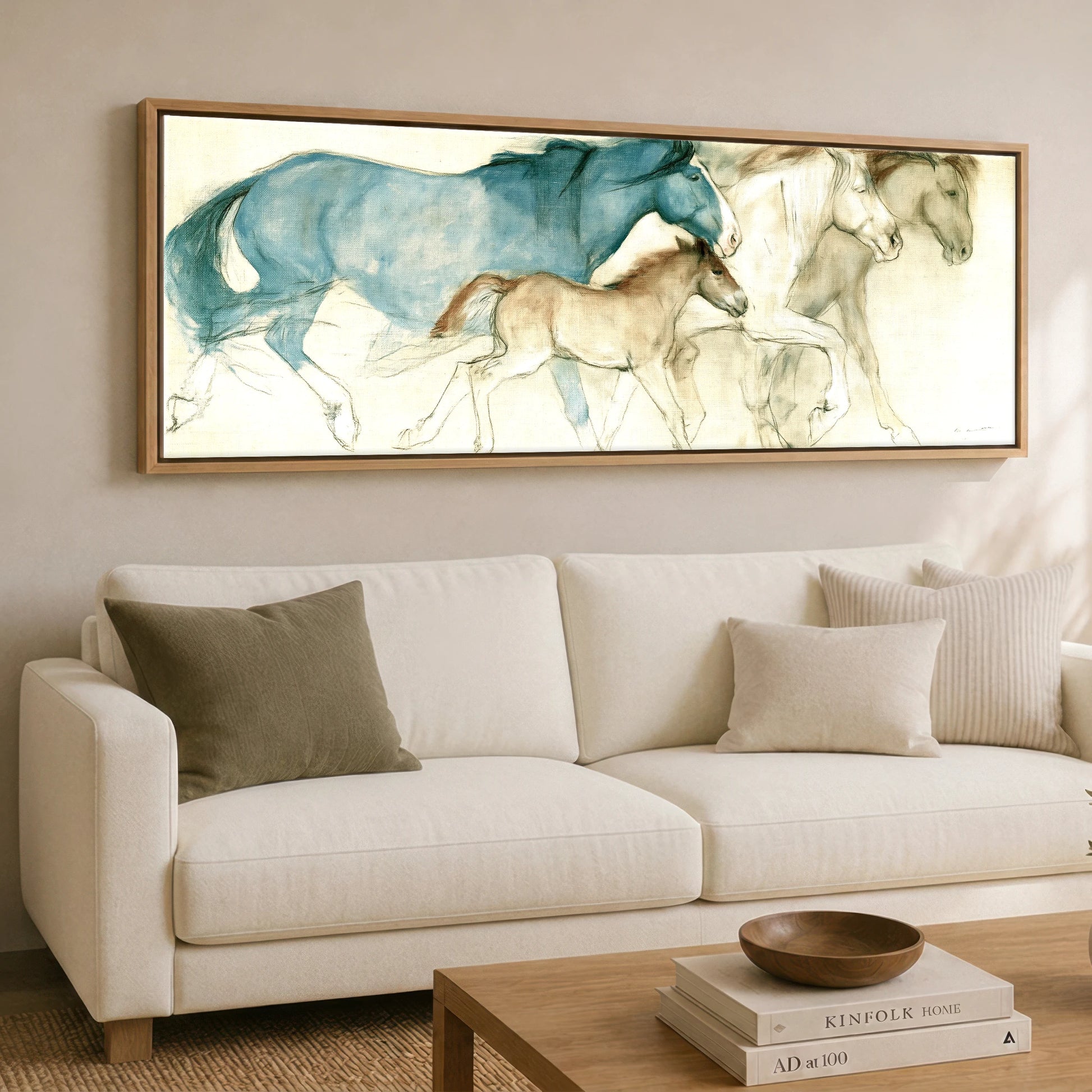 Azure Mare and Foal Mare & Foal panoramic canvas wall art displayed above a sofa
