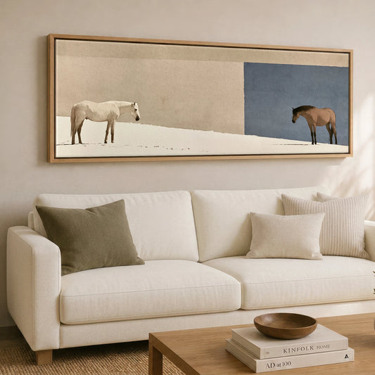 The Quiet Divide Horse Landscape panoramic canvas wall art displayed above a sofa