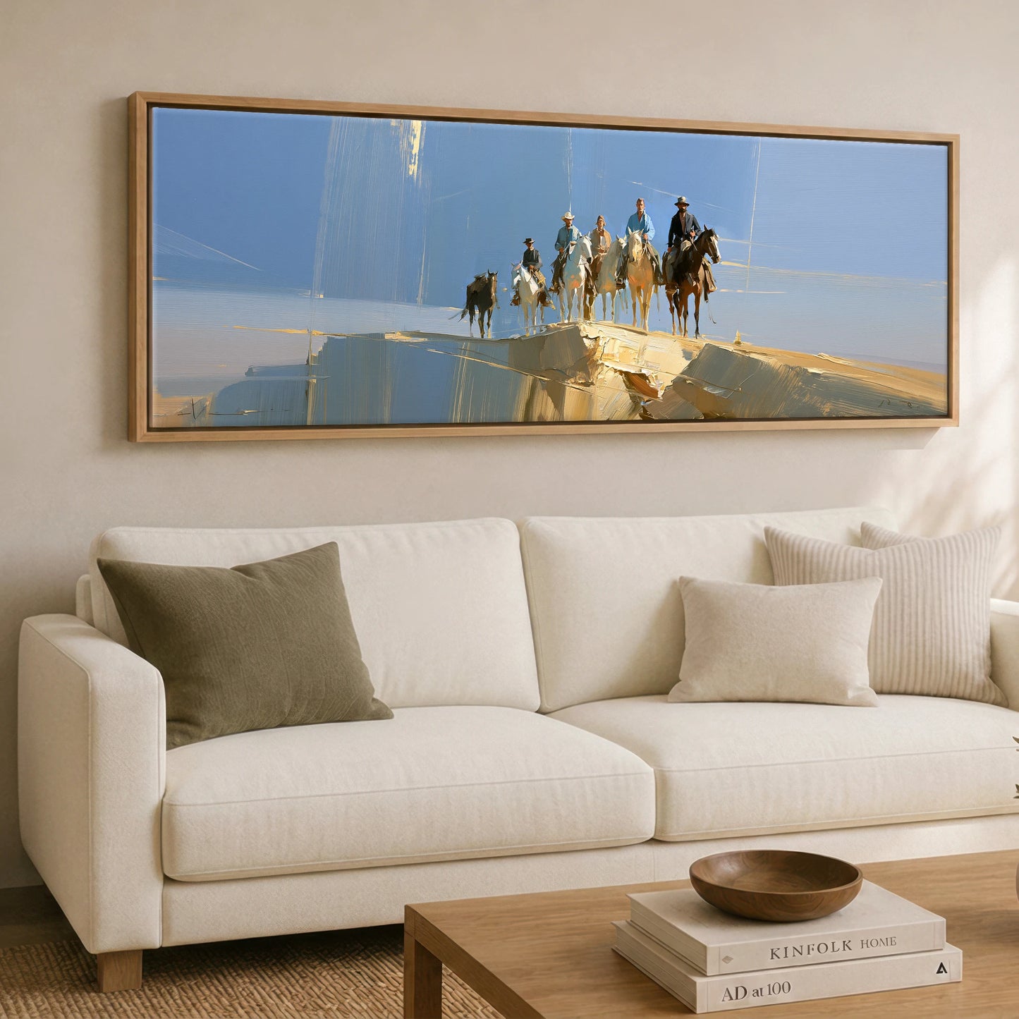 Cresting the Ridge Horse & Rider panoramic canvas wall art displayed above a sofa