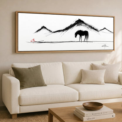 Silent Peaks Grazing Horse Landscape panoramic canvas wall art displayed above a sofa