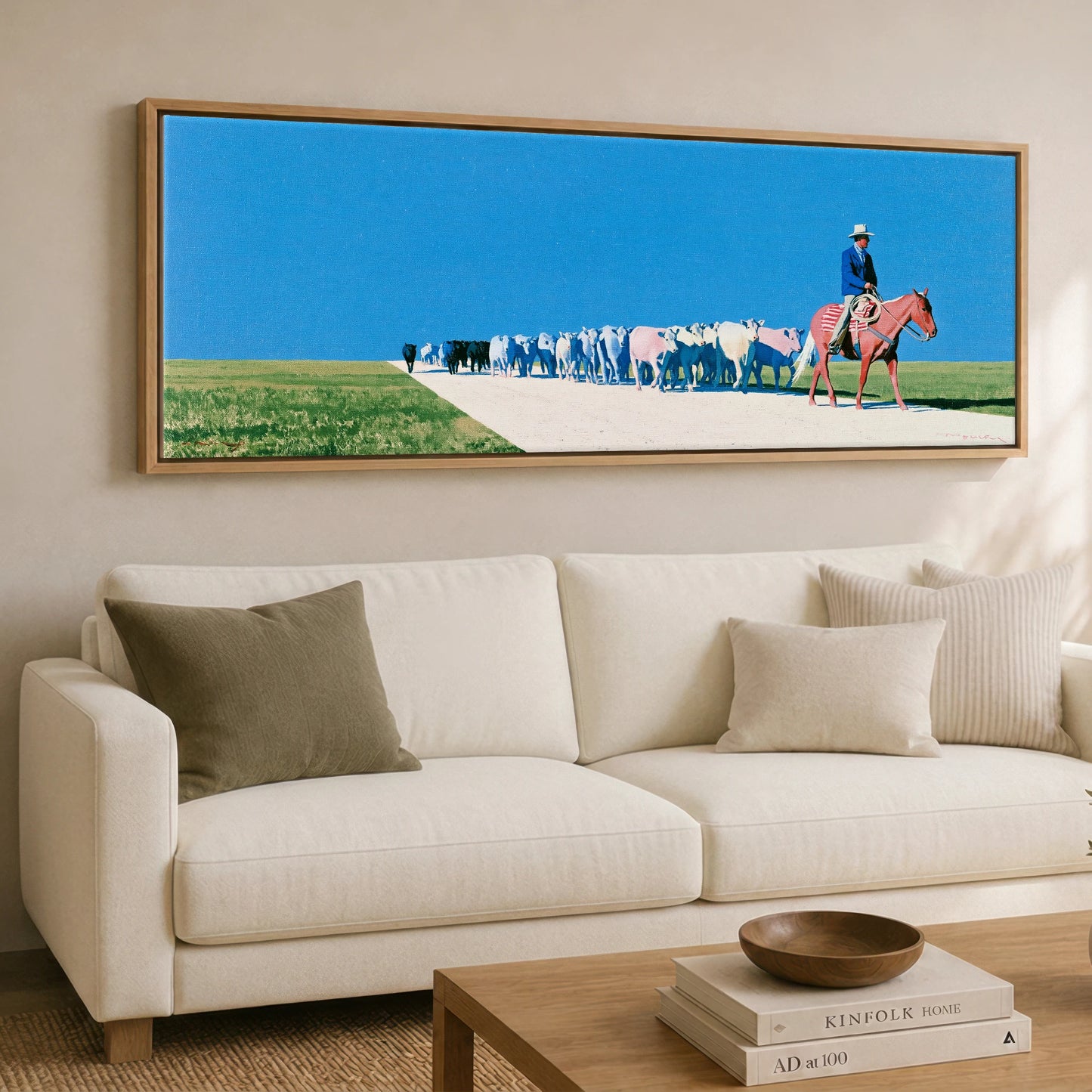 The Long Trail Western Horse panoramic canvas wall art displayed above a sofa