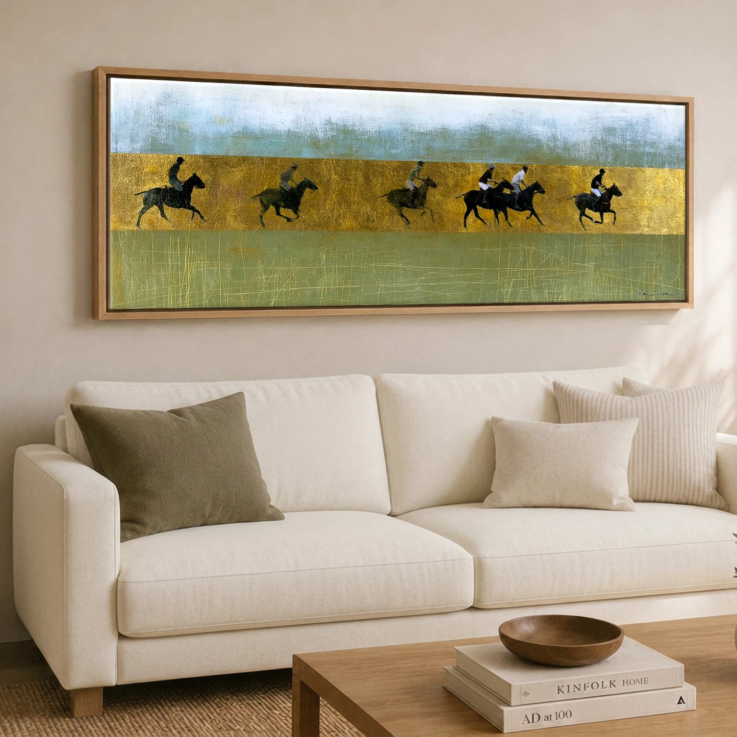 Gilded Pursuit Polo Horse panoramic canvas wall art displayed above a sofa