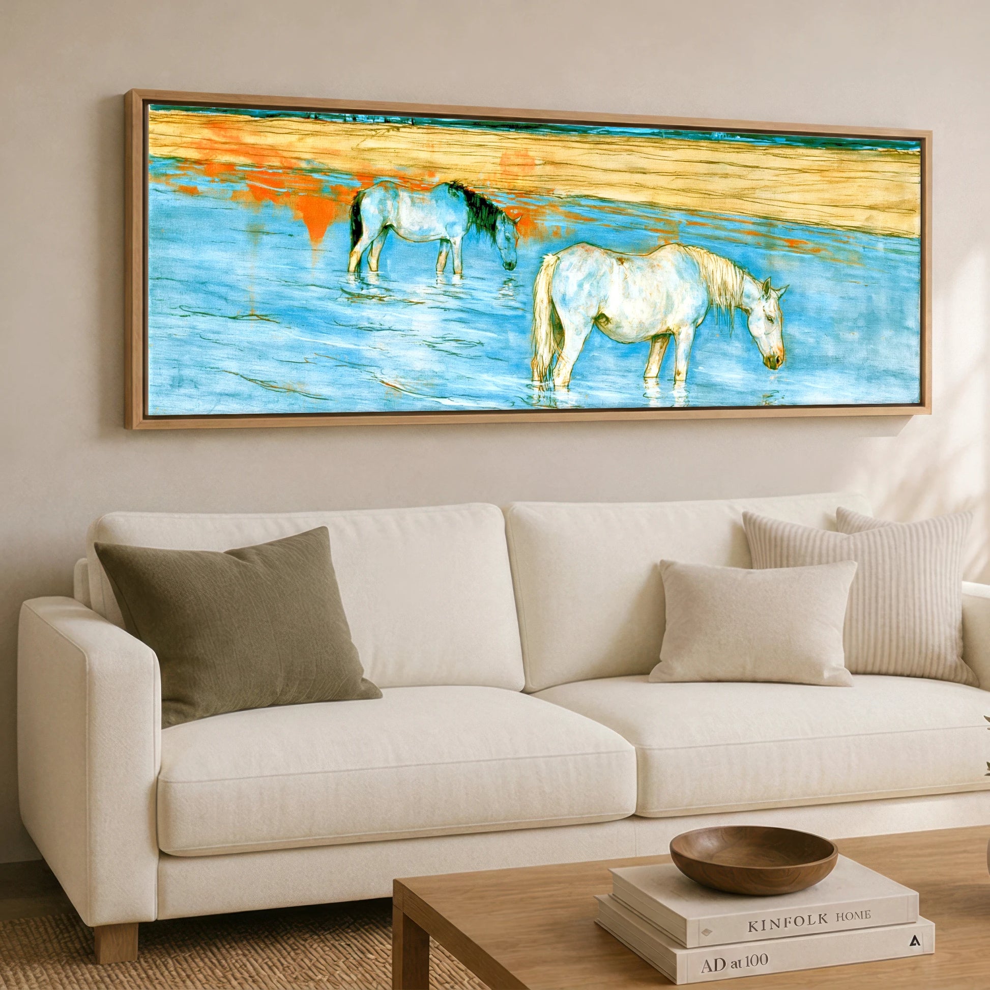 Cerulean Shoreline Greys Beach Horse panoramic canvas wall art displayed above a sofa