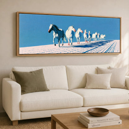 Azure Winter Gallop Horse Landscape panoramic canvas wall art displayed above a sofa
