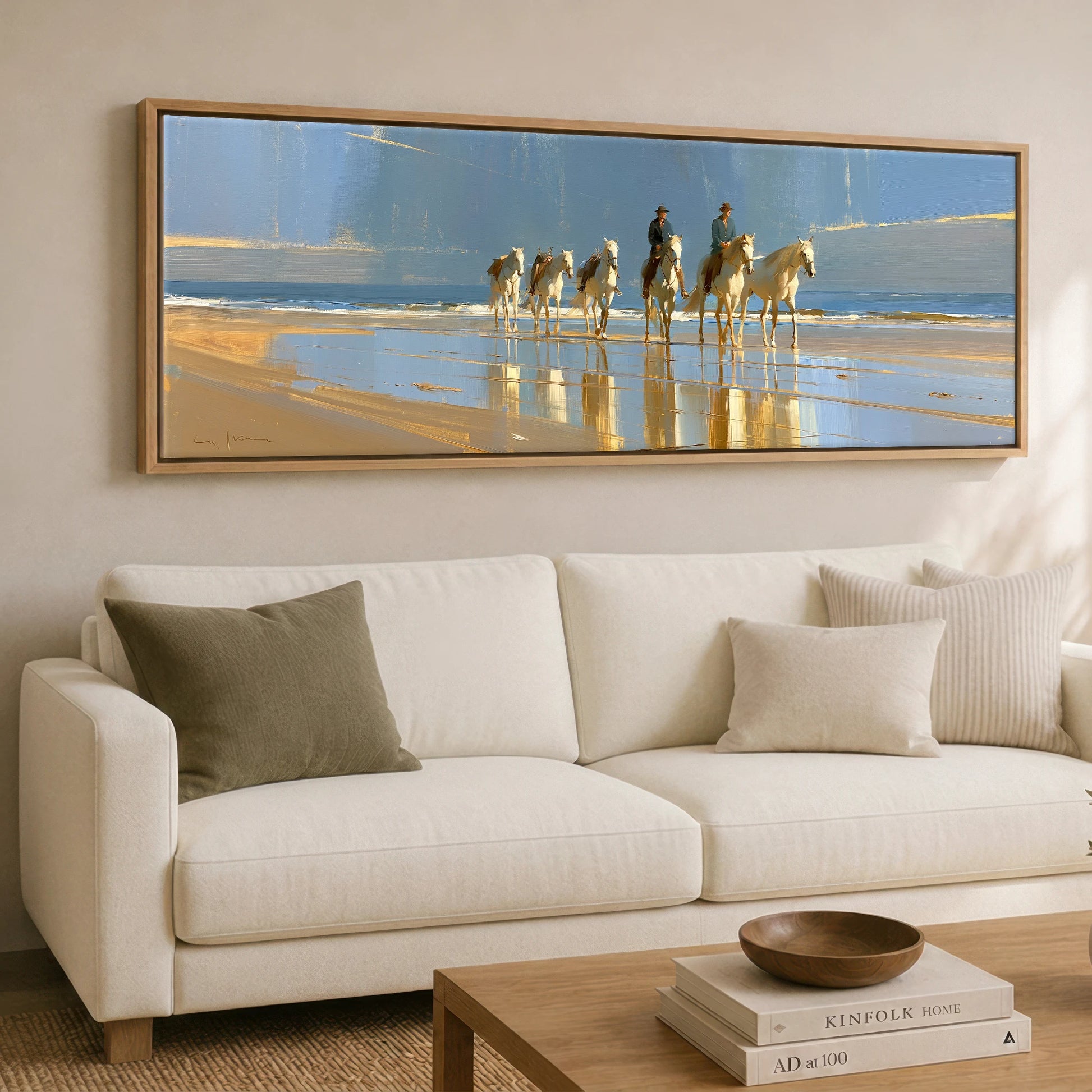 The Coastal String Horse Landscape panoramic canvas wall art displayed above a sofa