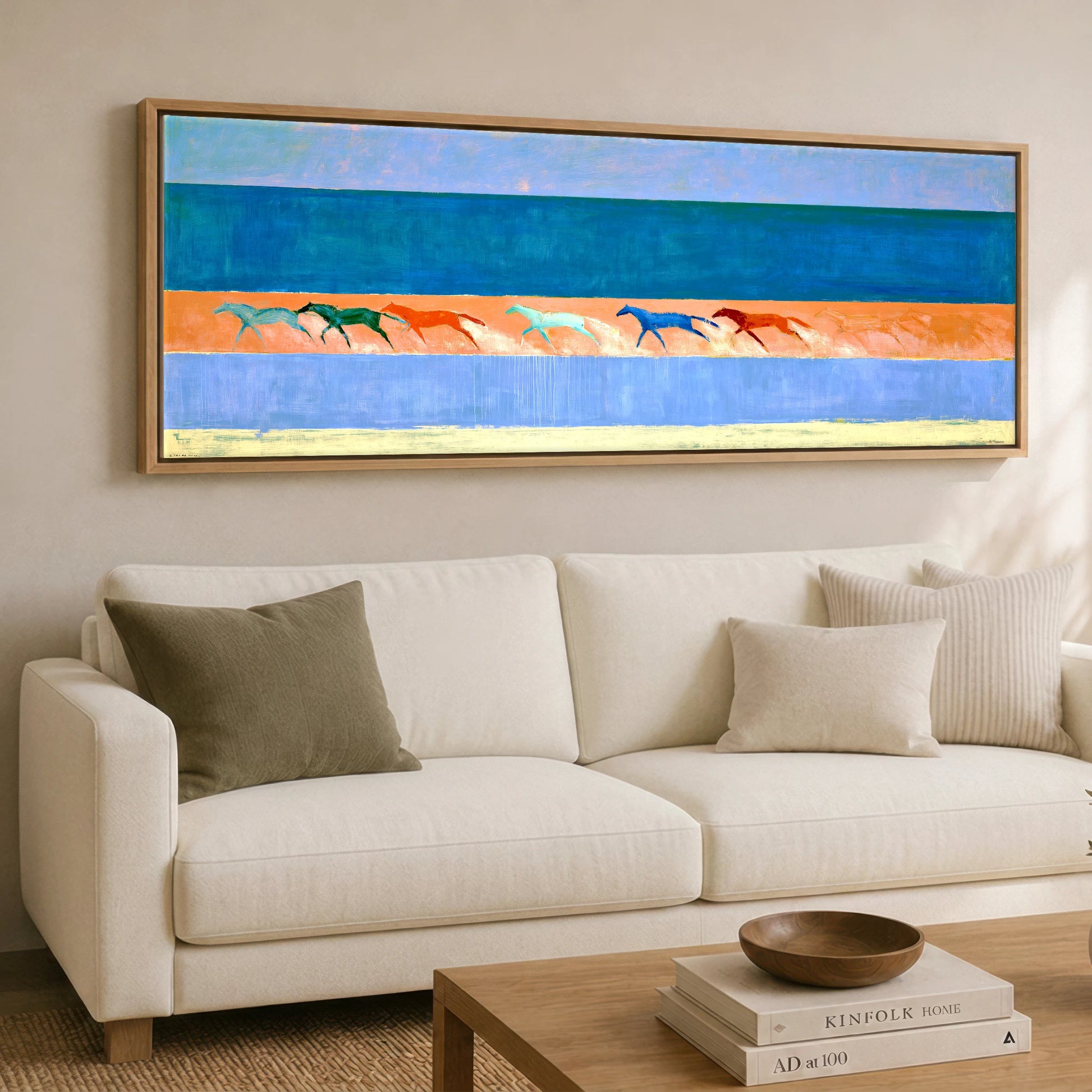 Rhythm of the Coast Beach Horse panoramic canvas wall art displayed above a sofa