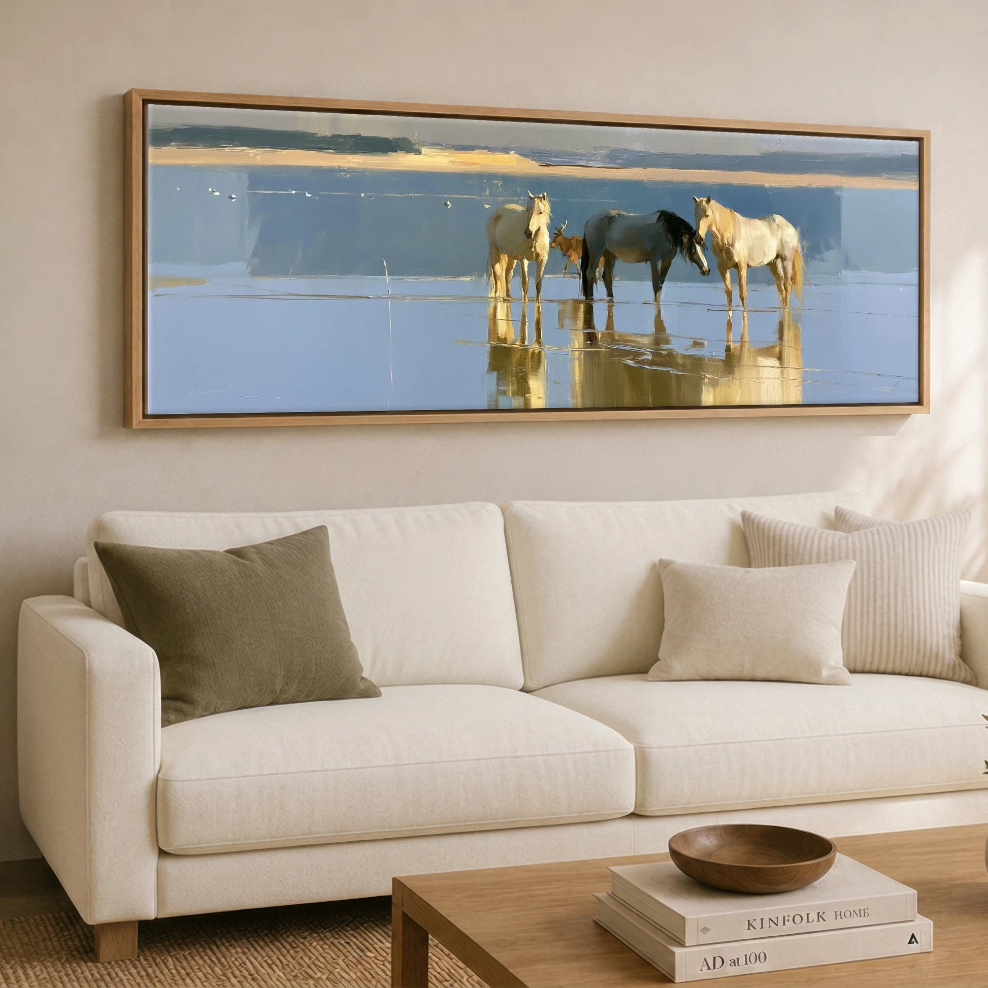 Coastal Reflections Beach Horse panoramic canvas wall art displayed above a sofa