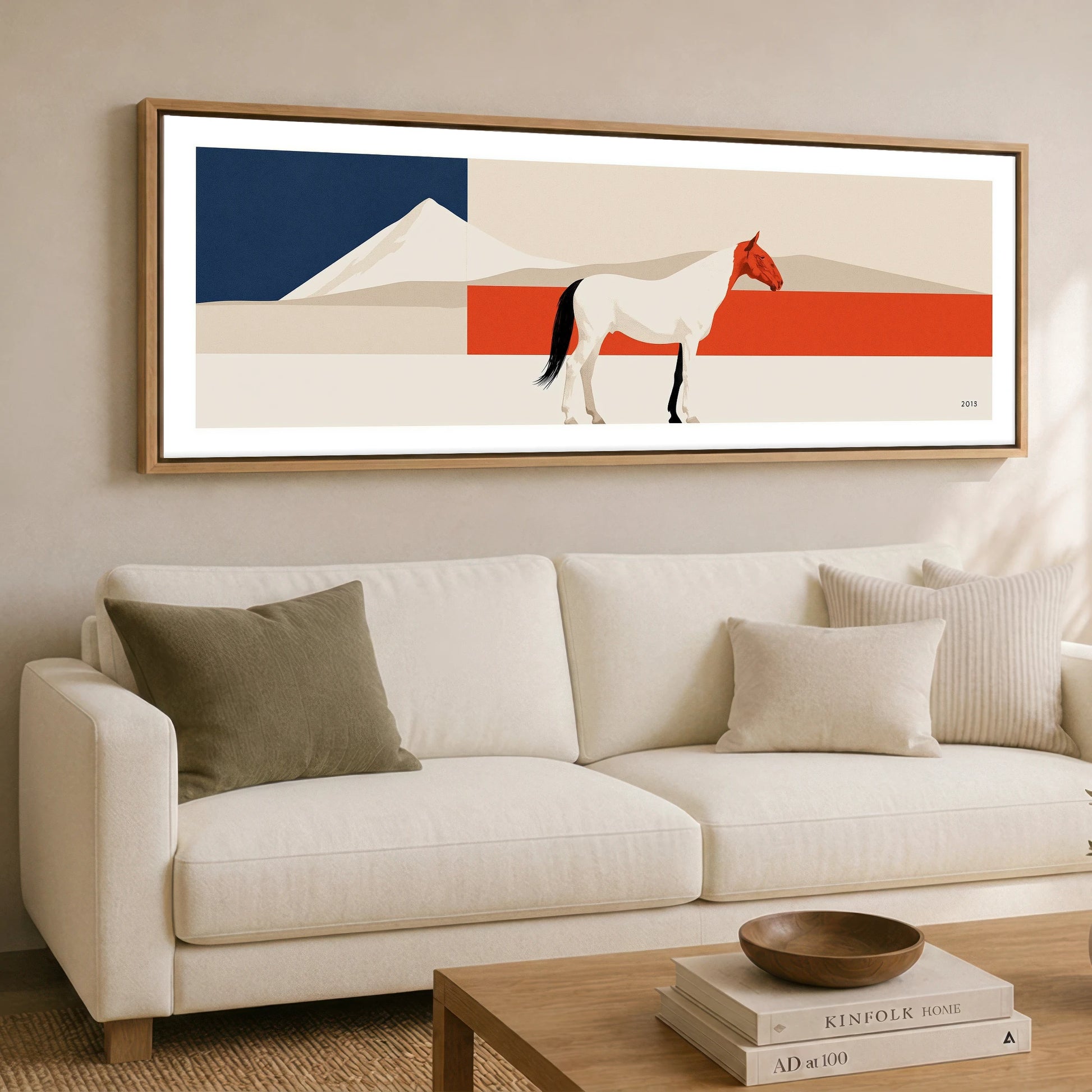 Bold Equine Horizon Horse Landscape panoramic canvas wall art displayed above a sofa