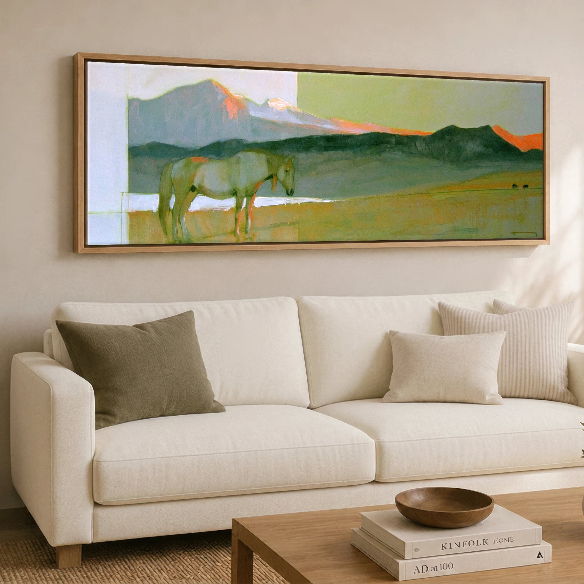 Pastel Mountain Light Horse Landscape panoramic canvas wall art displayed above a sofa