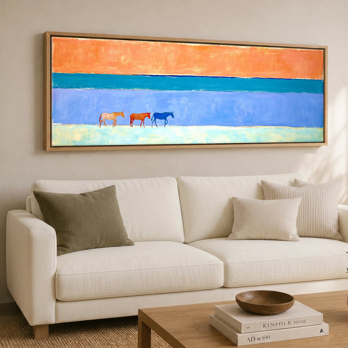 Horizon Wanderers Beach Horse panoramic canvas wall art displayed above a sofa