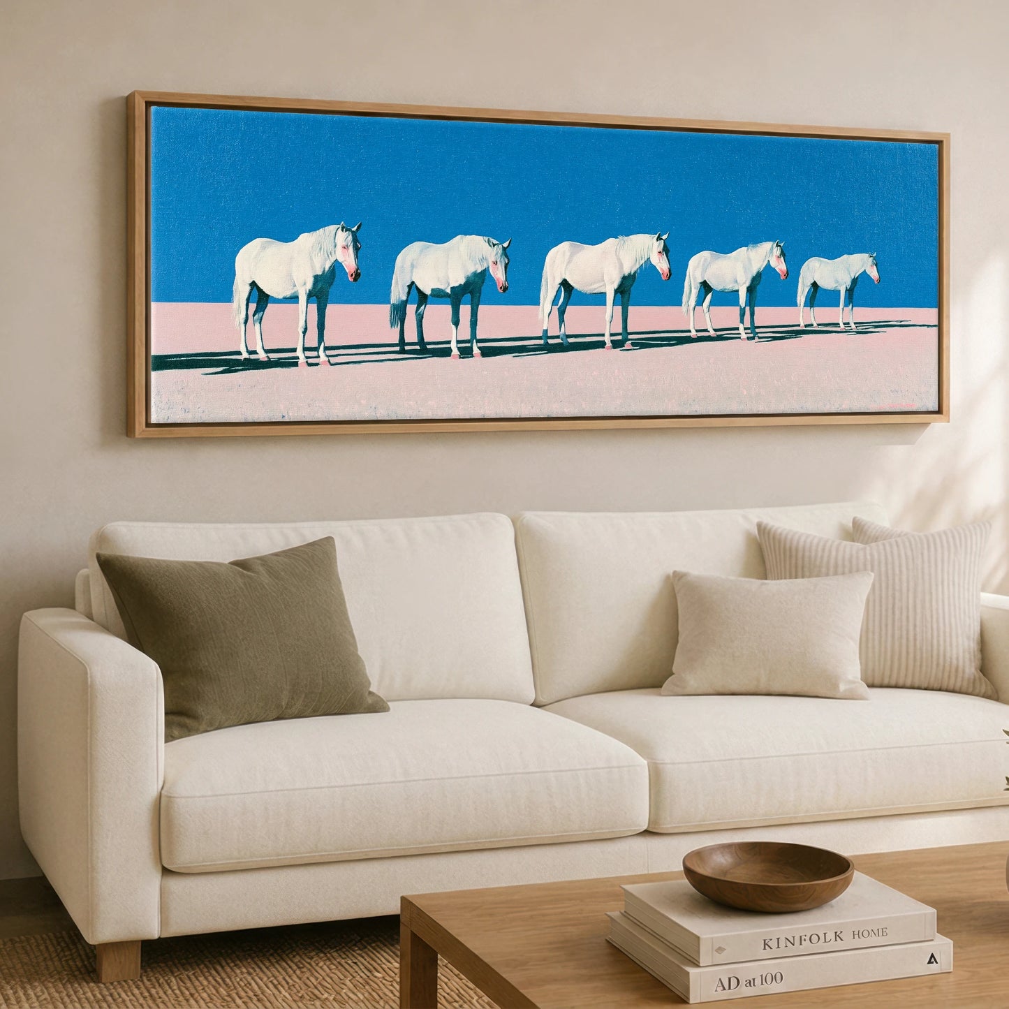 Rhythm in Azure Horse Landscape panoramic canvas wall art displayed above a sofa