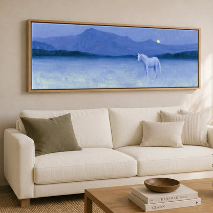Solitary Grey Under Moonlight Horse Landscape panoramic canvas wall art displayed above a sofa