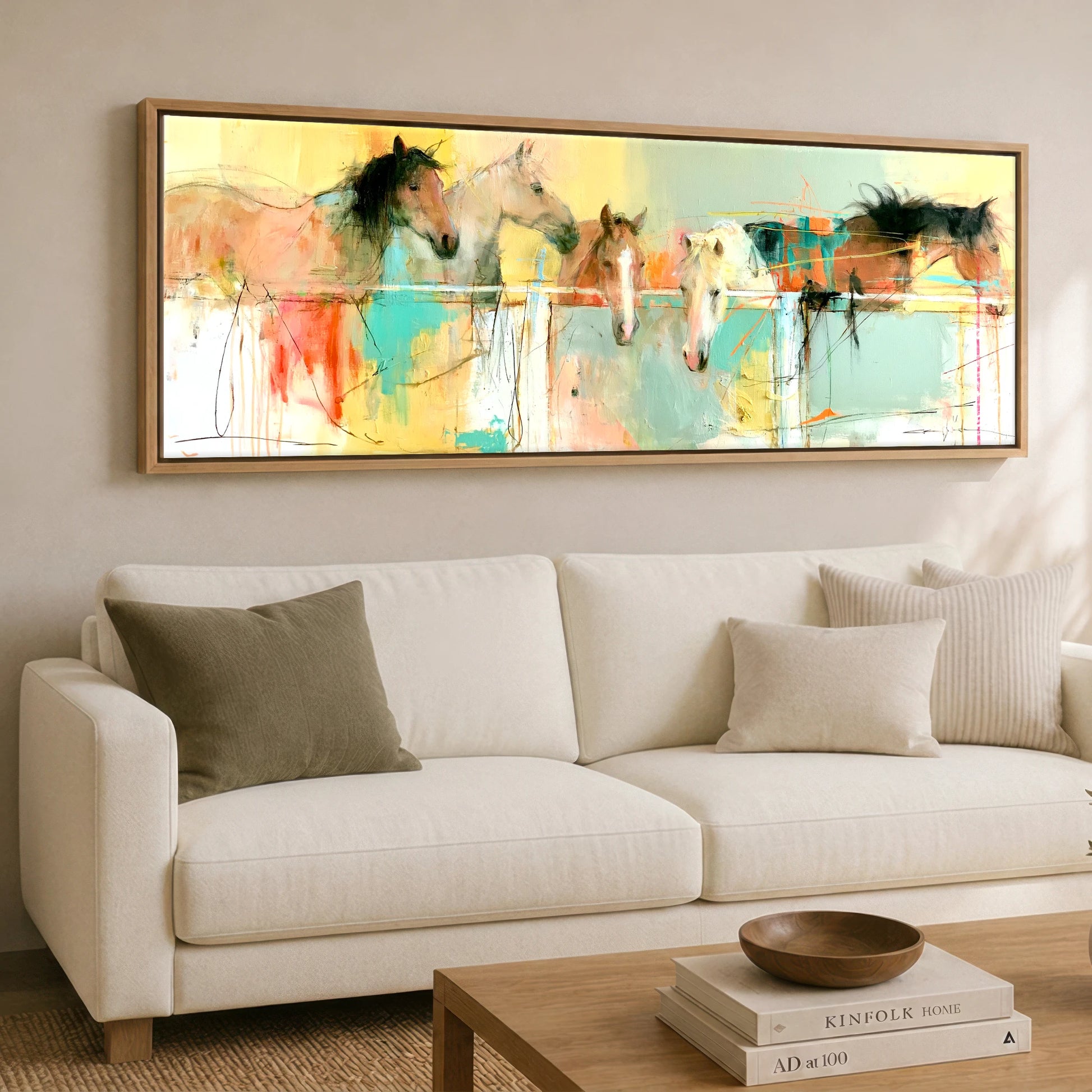 Over the Rail Horse Stable panoramic canvas wall art displayed above a sofa