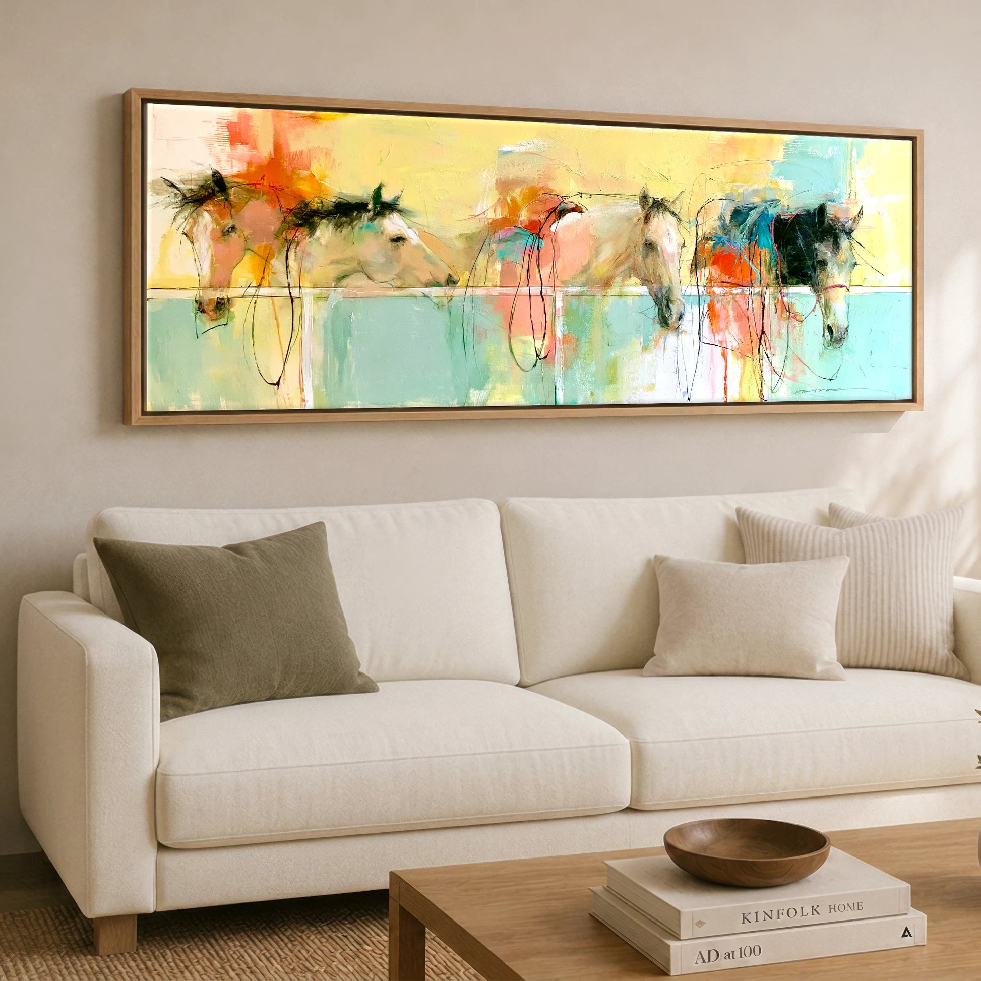 Vibrant Stable Companions Horse Stable panoramic canvas wall art displayed above a sofa