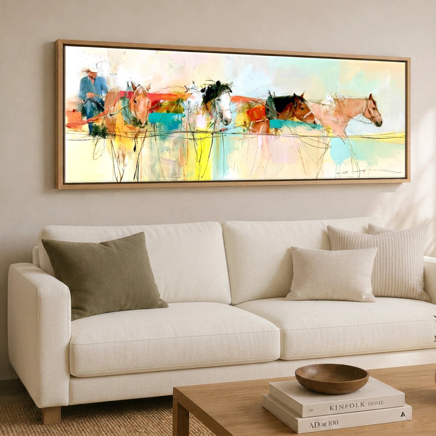 The Working String Working Horse panoramic canvas wall art displayed above a sofa