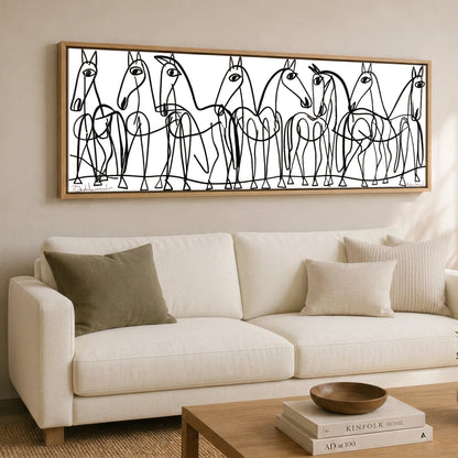 The Line Drawn Herd Horse Landscape panoramic canvas wall art displayed above a sofa