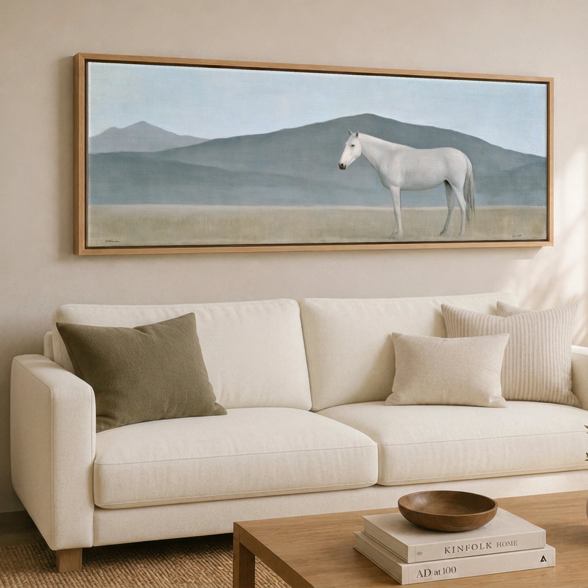 Stoic Grey in Slate Horse Landscape panoramic canvas wall art displayed above a sofa