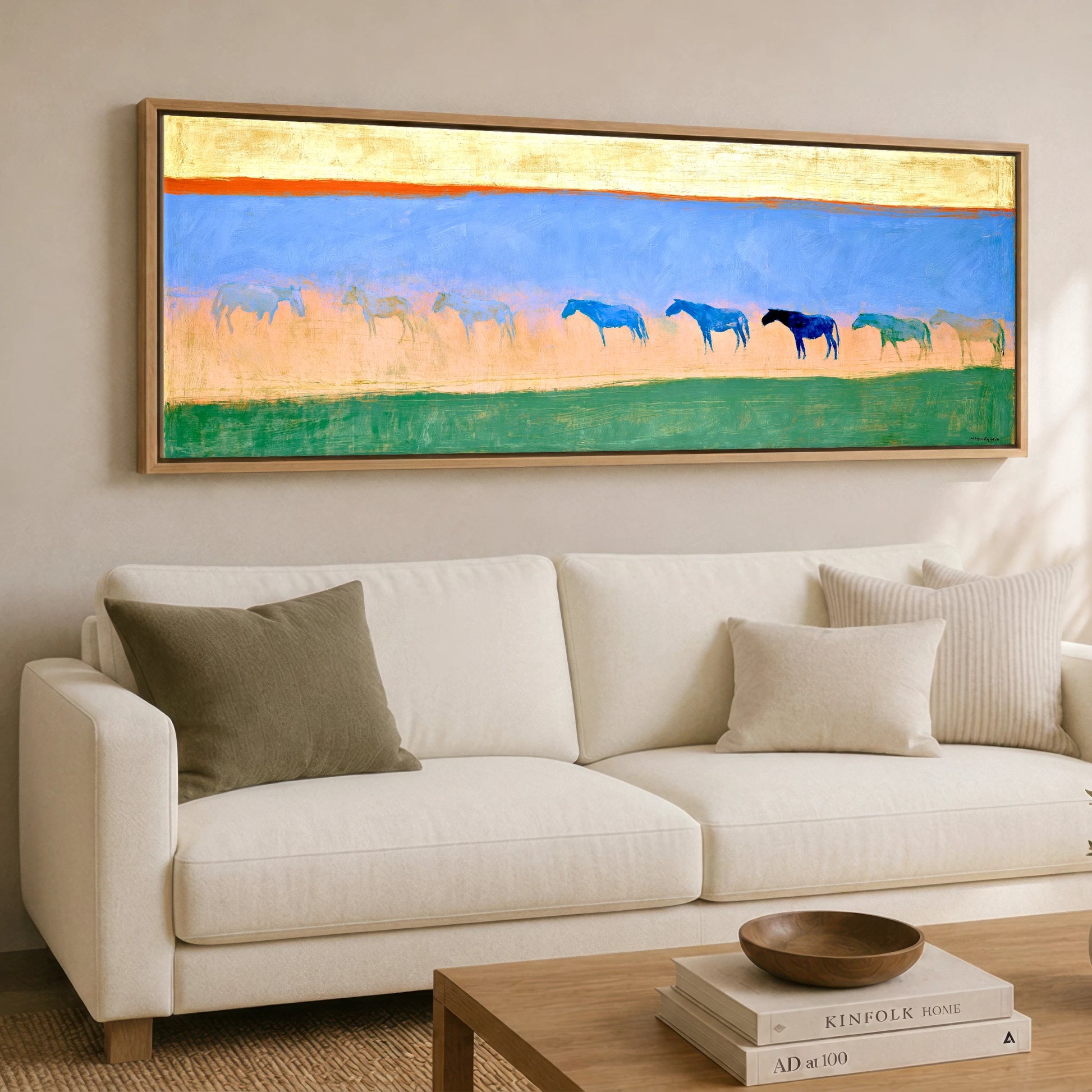 Cobalt Horizon Herd Horse Landscape panoramic canvas wall art displayed above a sofa