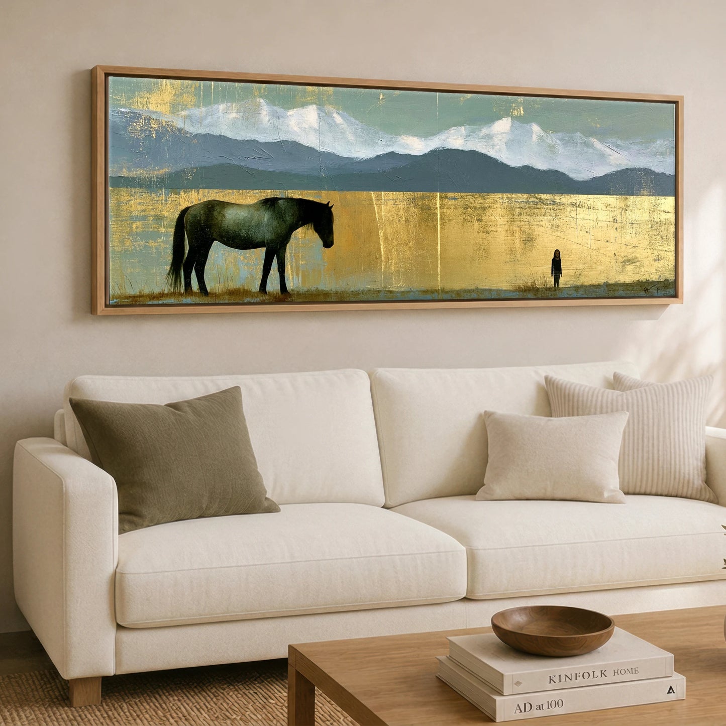 The Golden Expanse Horse Landscape panoramic canvas wall art displayed above a sofa