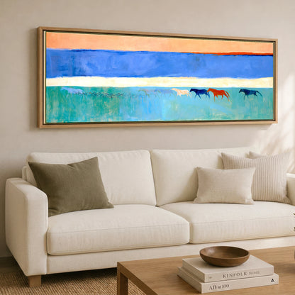 Across the Painted Tide Horse Landscape panoramic canvas wall art displayed above a sofa