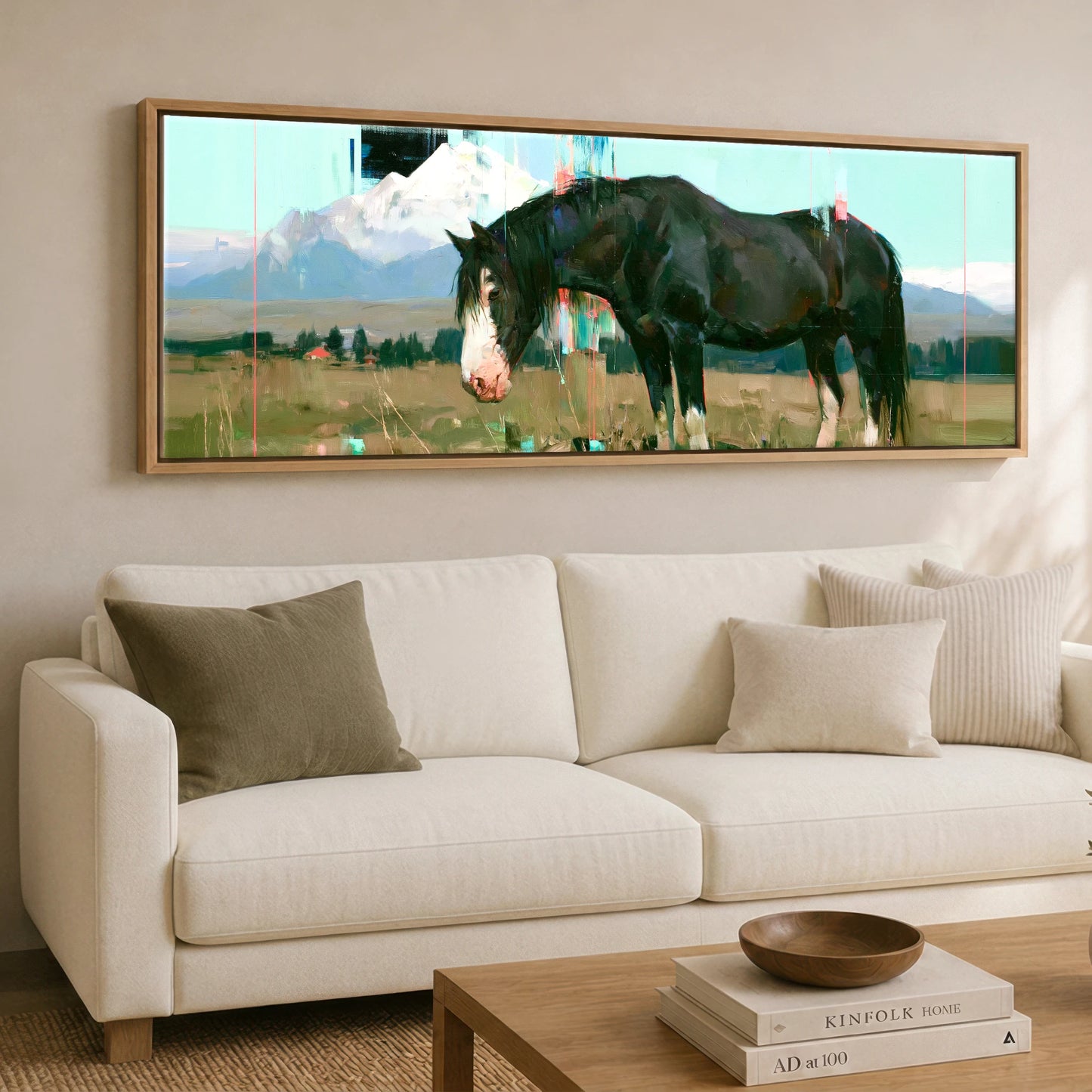 Midnight Coat Beneath Peaks Horse Landscape panoramic canvas wall art displayed above a sofa