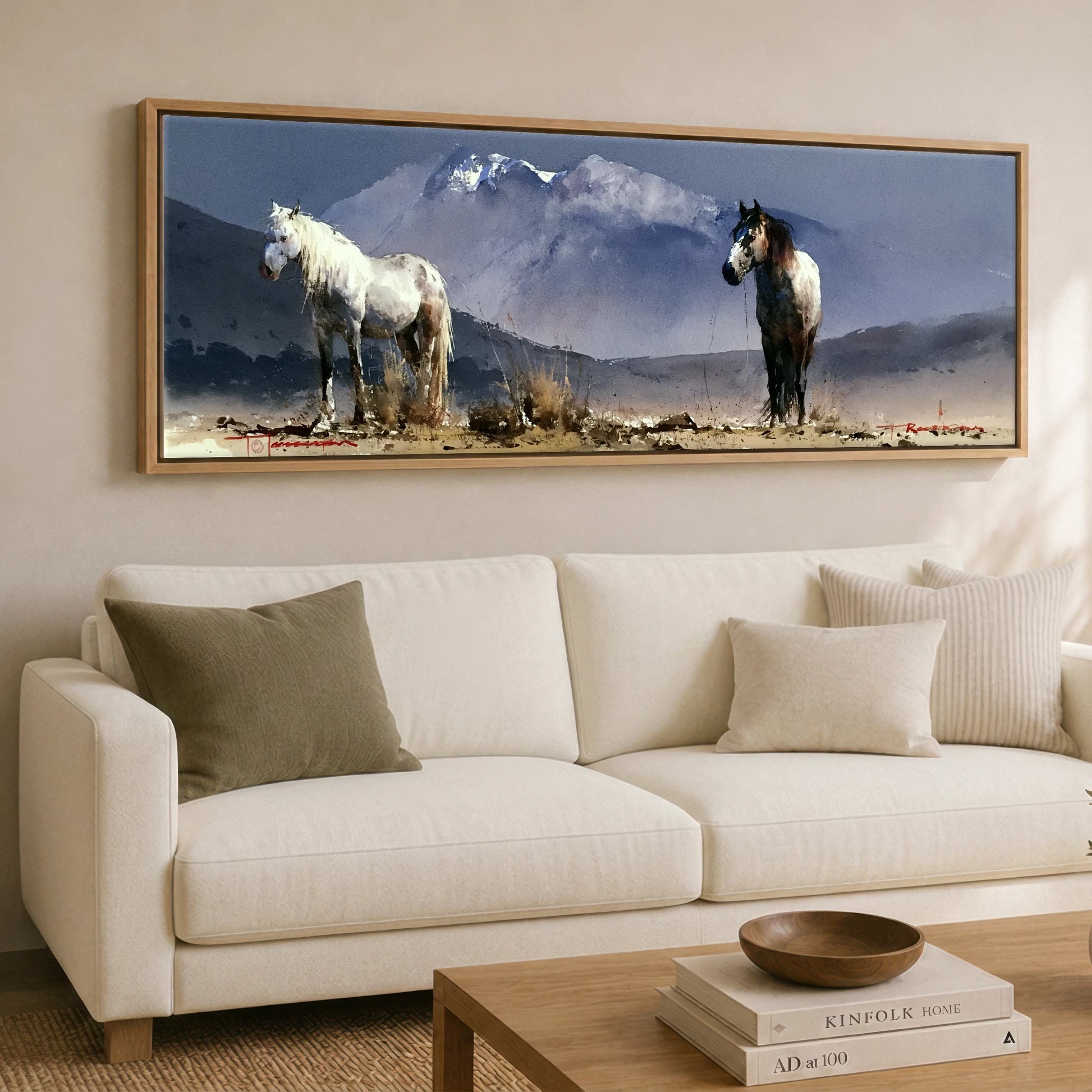 Mountain Solitude Horse Landscape panoramic canvas wall art displayed above a sofa