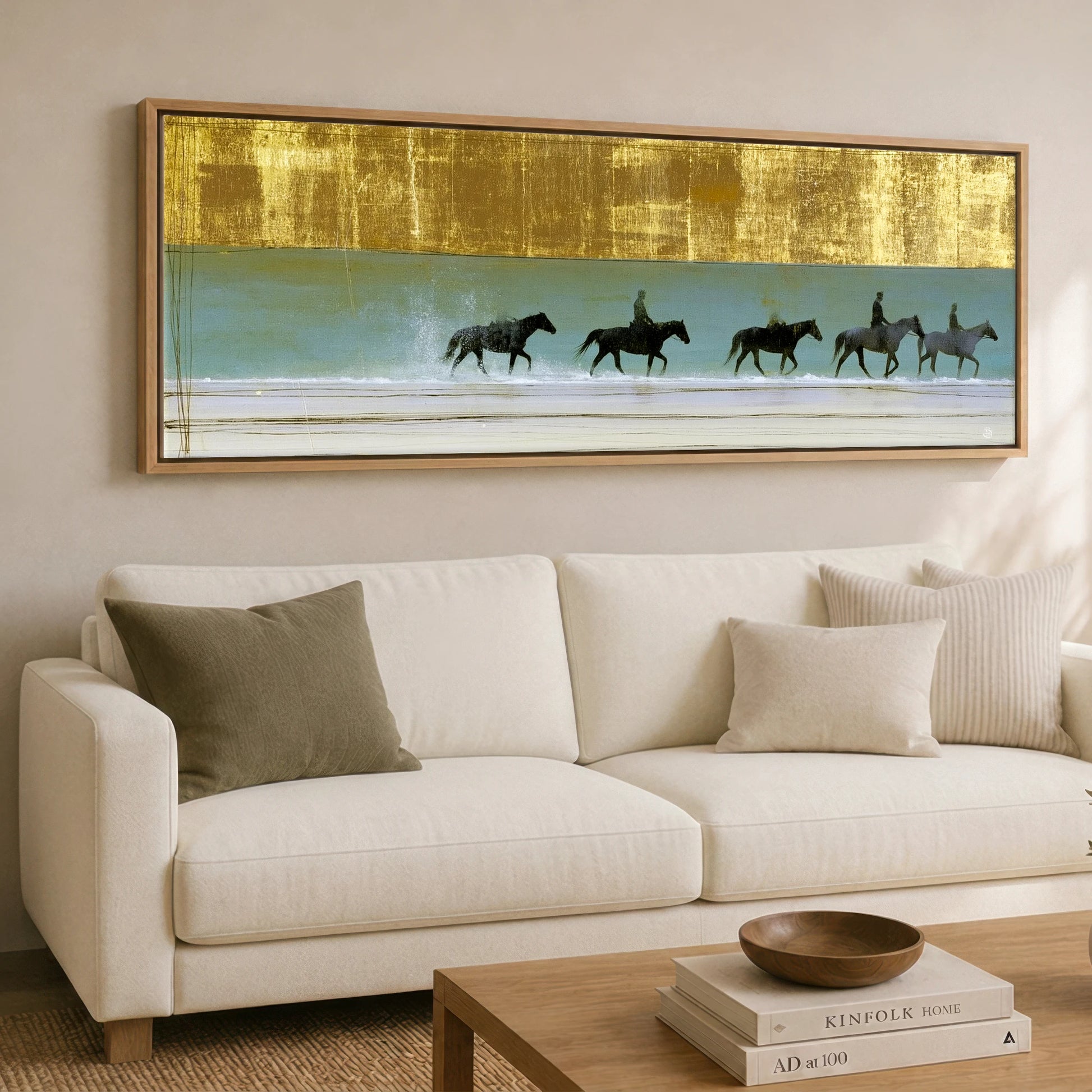 Gilded Shallows Beach Horse panoramic canvas wall art displayed above a sofa