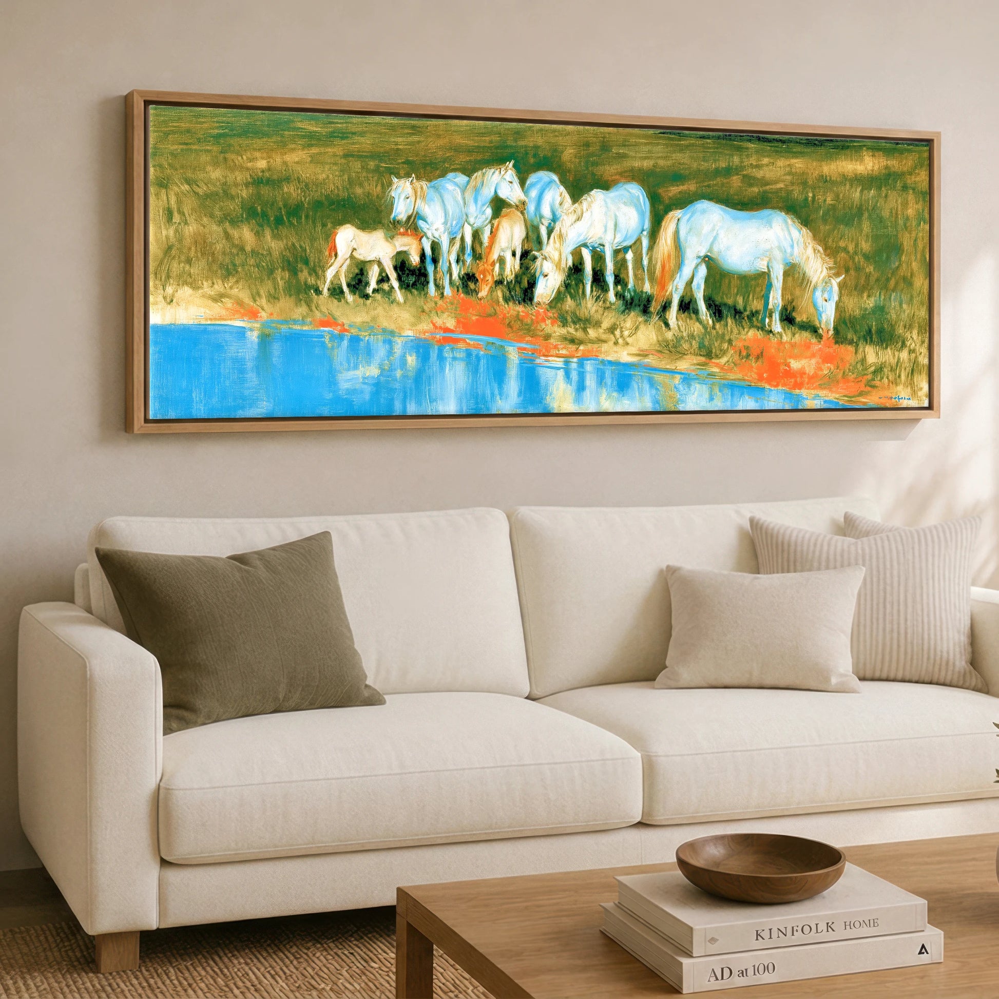 Vivid Waterside Herd Wild Horses panoramic canvas wall art displayed above a sofa