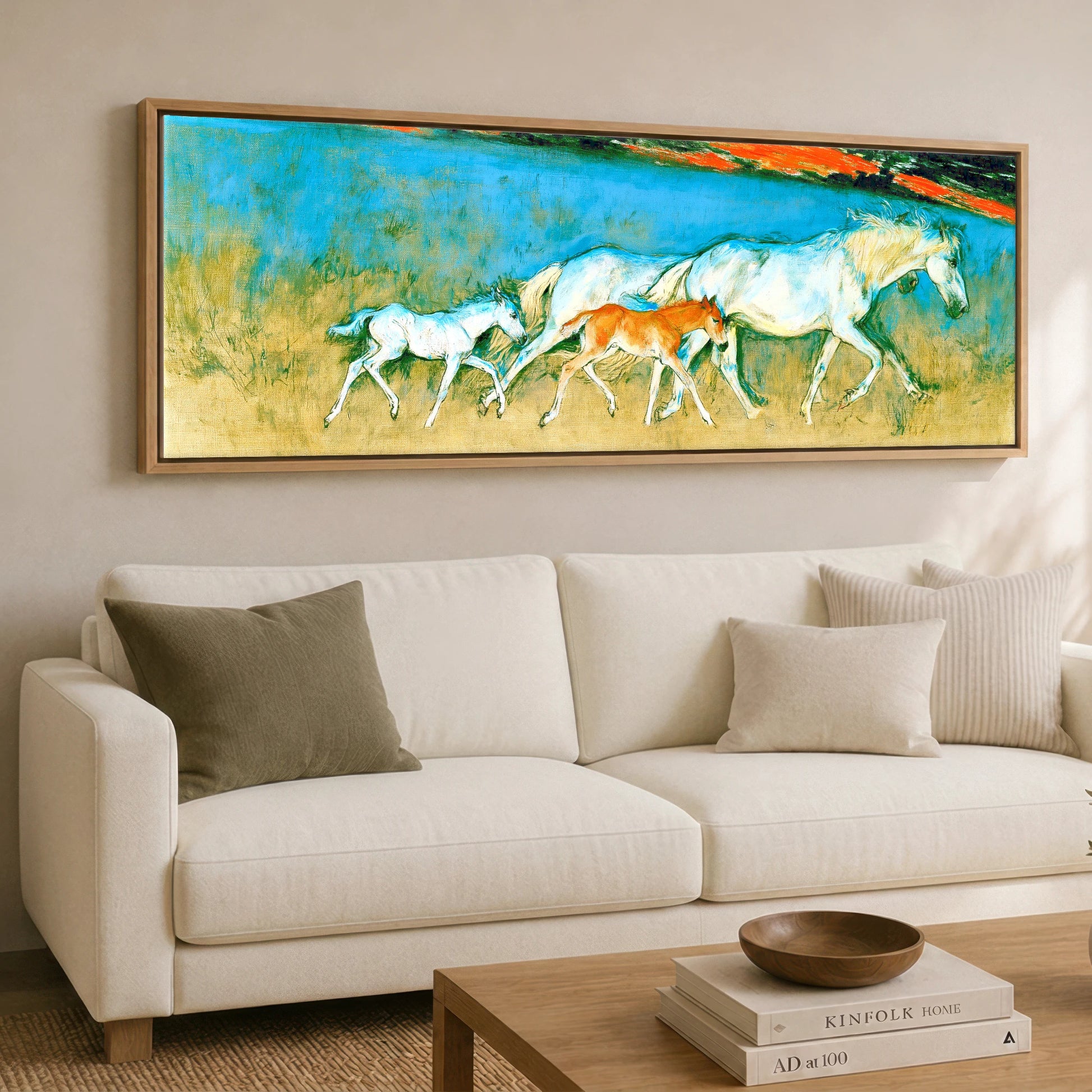 Vibrant Azure Strides Mare & Foal panoramic canvas wall art displayed above a sofa