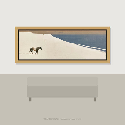 Sweeping Silence Horse Landscape panoramic wall art displayed above a sofa